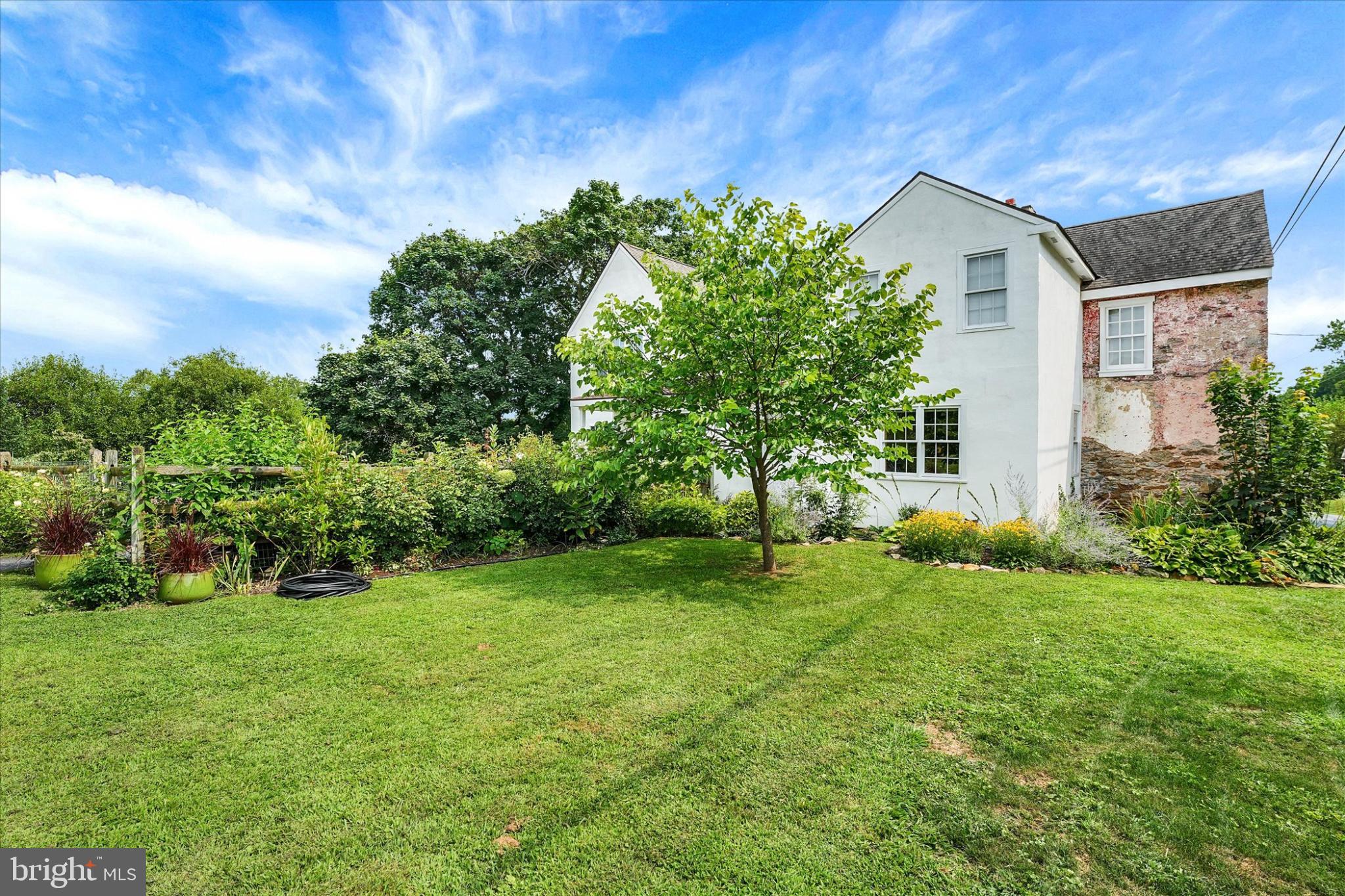 180 Springdell Road Coatesville, PA 19320 - Photo 33 of 55 a view of an house with backyard space and garden