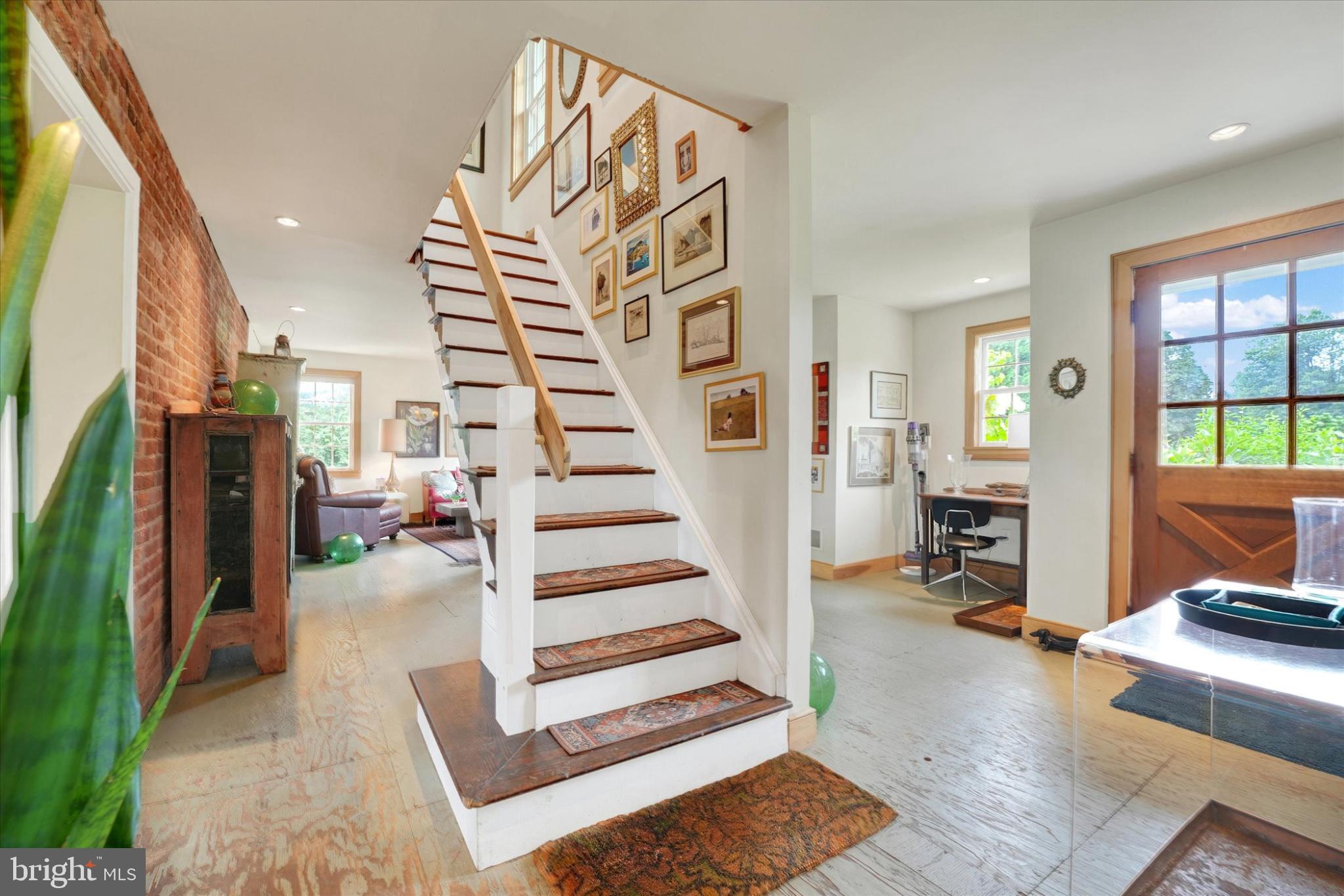 180 Springdell Road Coatesville, PA 19320 - Photo 4 of 55 a view of entryway and hall with wooden floor