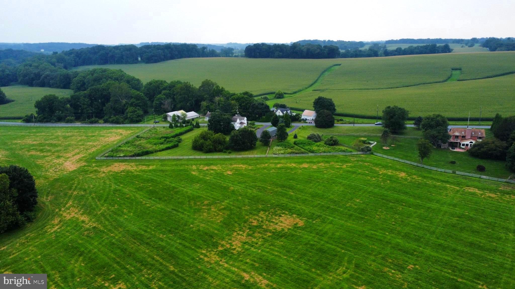 180 Springdell Road Coatesville, PA 19320 - Photo 43 of 55 a view of a field with sitting area