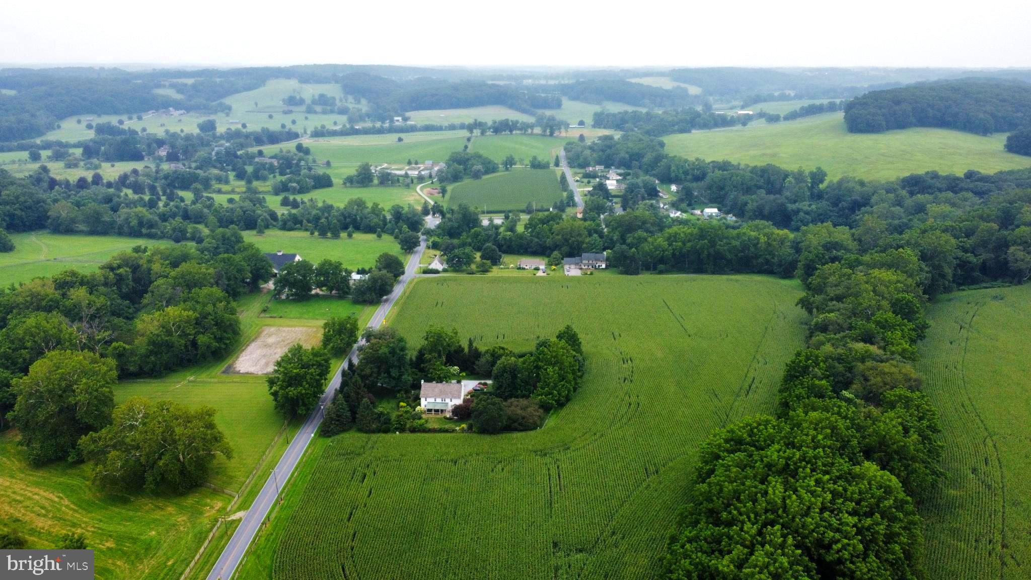 180 Springdell Road Coatesville, PA 19320 - Photo 49 of 55 an aerial view of a golf course with parking space