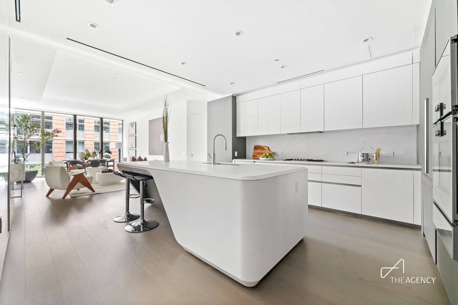 520 West 28th Street, Unit 7 Manhattan, NY 10001 - Photo 1 of 24 a kitchen that has a lot of cabinets in it and appliances