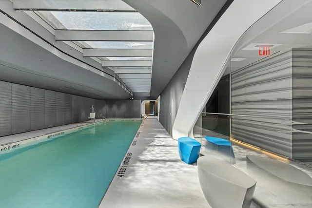 a house with stairs and a large window