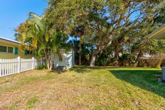 a view of a yard in front of a house