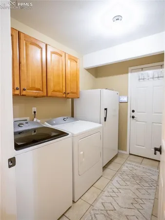 a view of utility room with washer and dryer