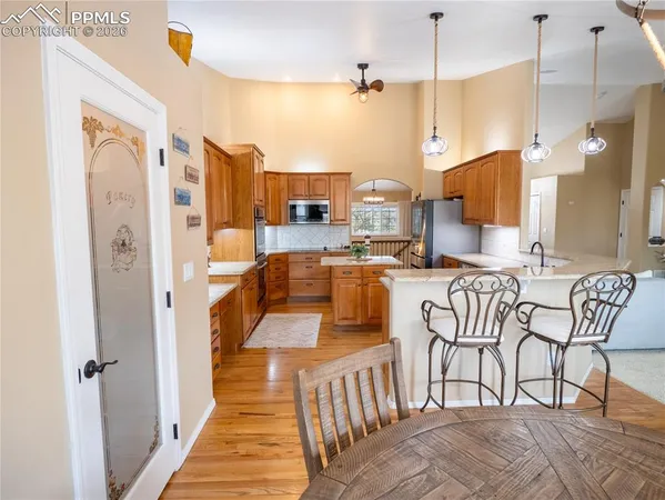 a very nice looking kitchen with a large window
