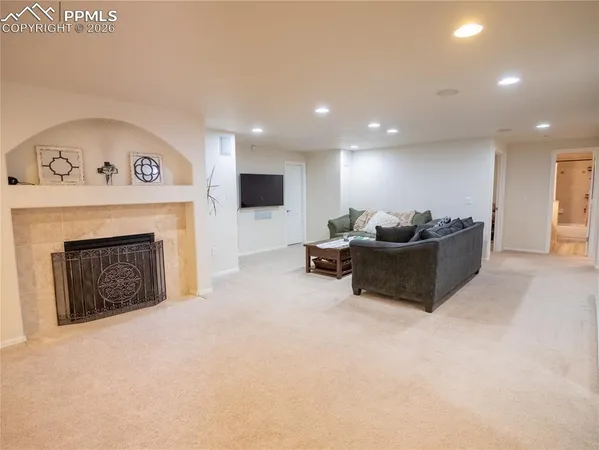 a view of a livingroom with a fireplace