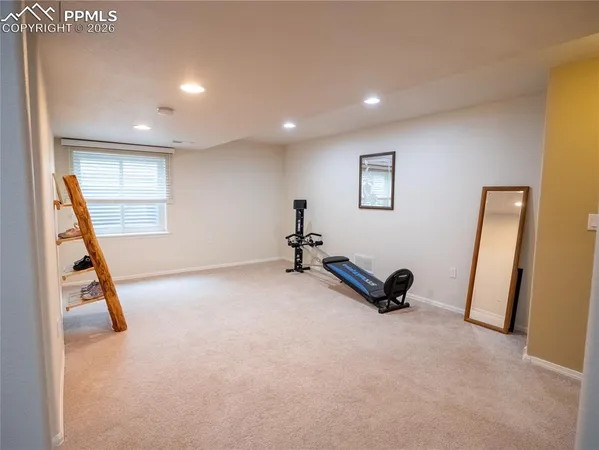 a view of a room with gym equipment
