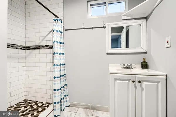 a view of a room with wooden floor and staircase