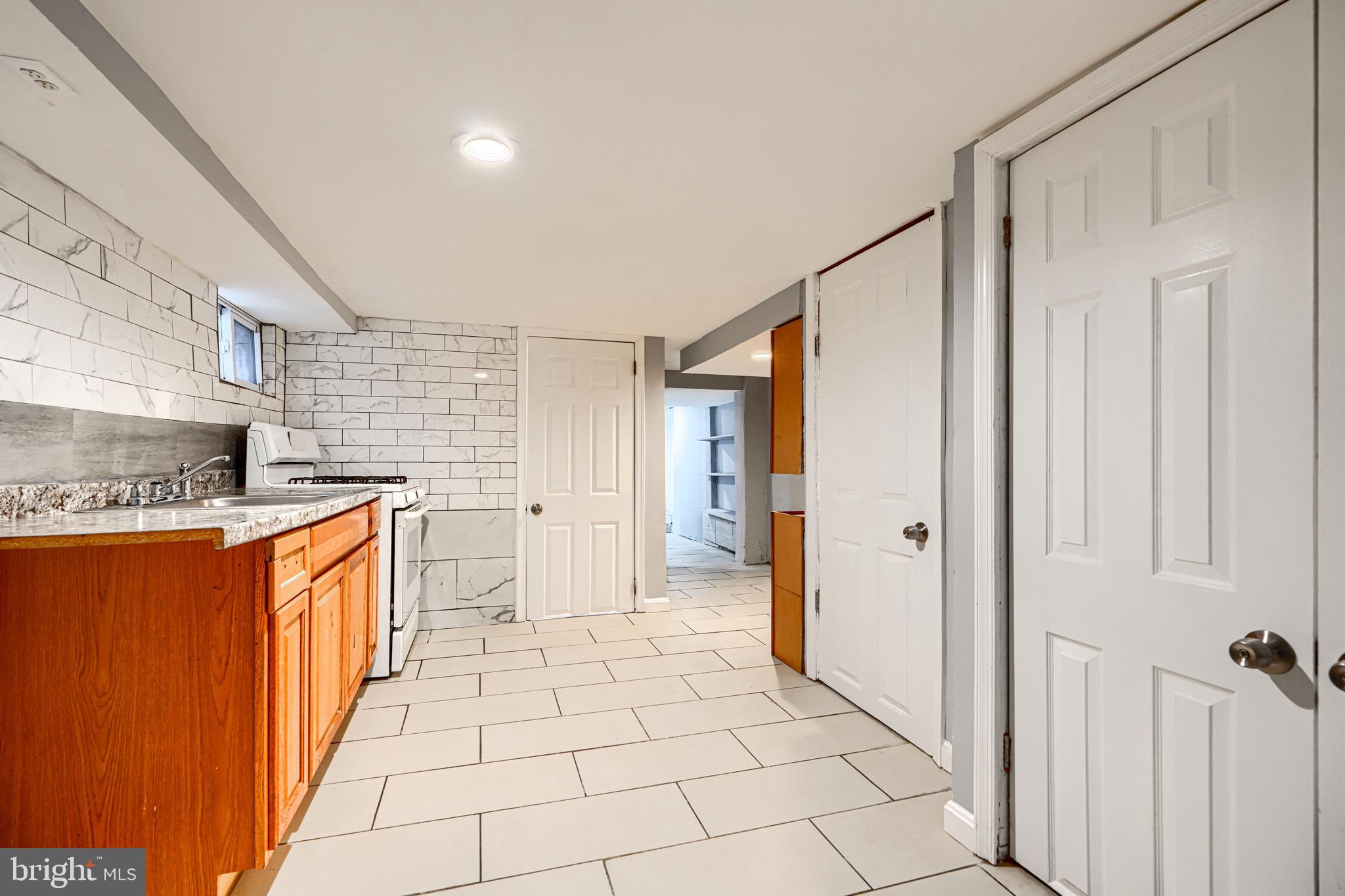 619 North Point Road Baltimore, MD 21224 - Photo 45 of 68 Lower level kitchen