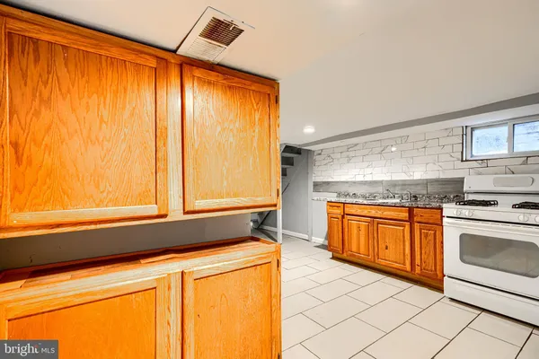a bathroom with a toilet and shower