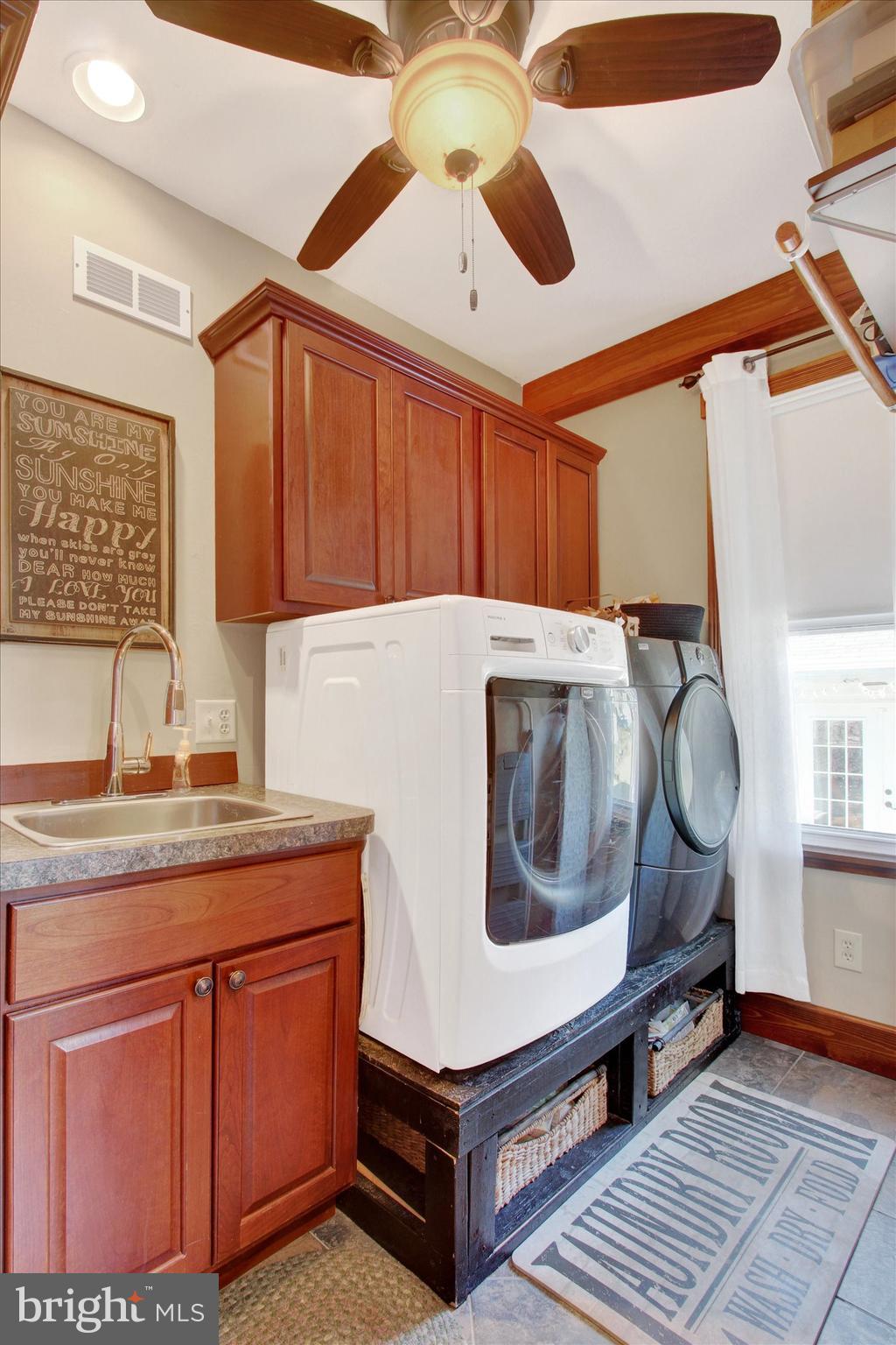 6 North Water Street Spring Grove, PA 17362 - Photo 11 of 37 a living room with a sink and dishwasher with kitchen view