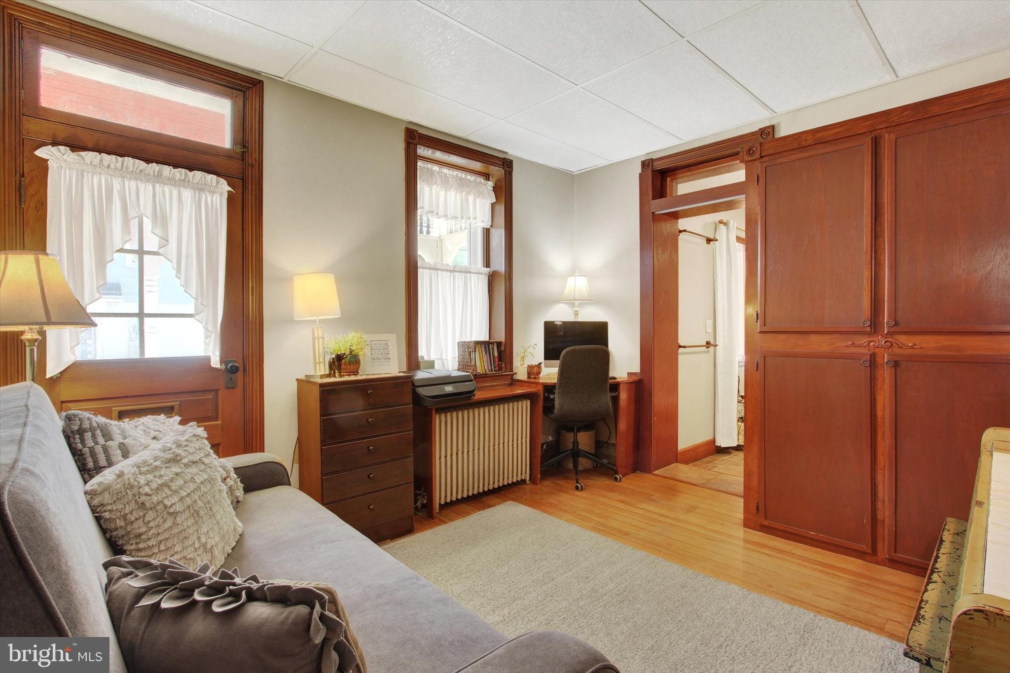 6 North Water Street Spring Grove, PA 17362 - Photo 12 of 37 a living room with furniture window and wooden floor
