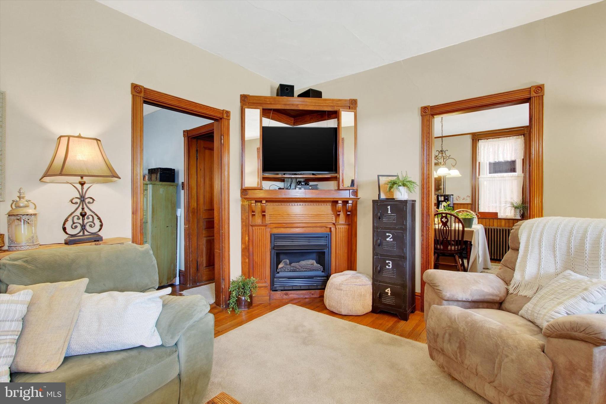 6 North Water Street Spring Grove, PA 17362 - Photo 17 of 37 a living room with furniture and a flat screen tv