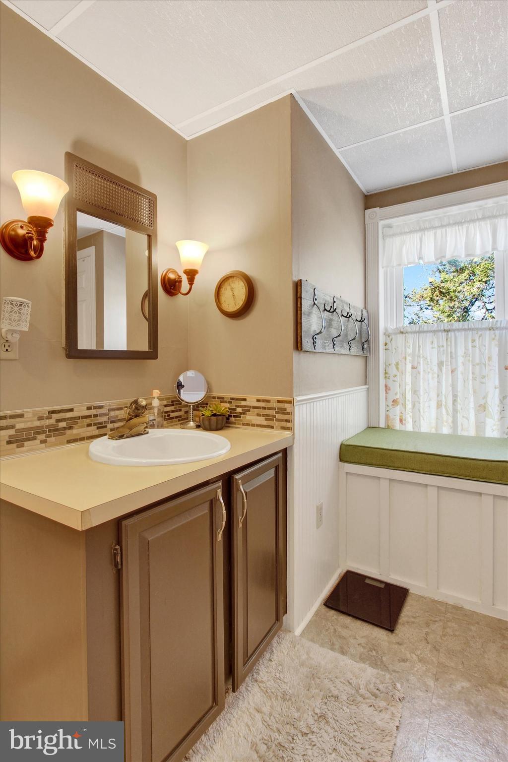 6 North Water Street Spring Grove, PA 17362 - Photo 24 of 37 a bathroom with a sink and a mirror