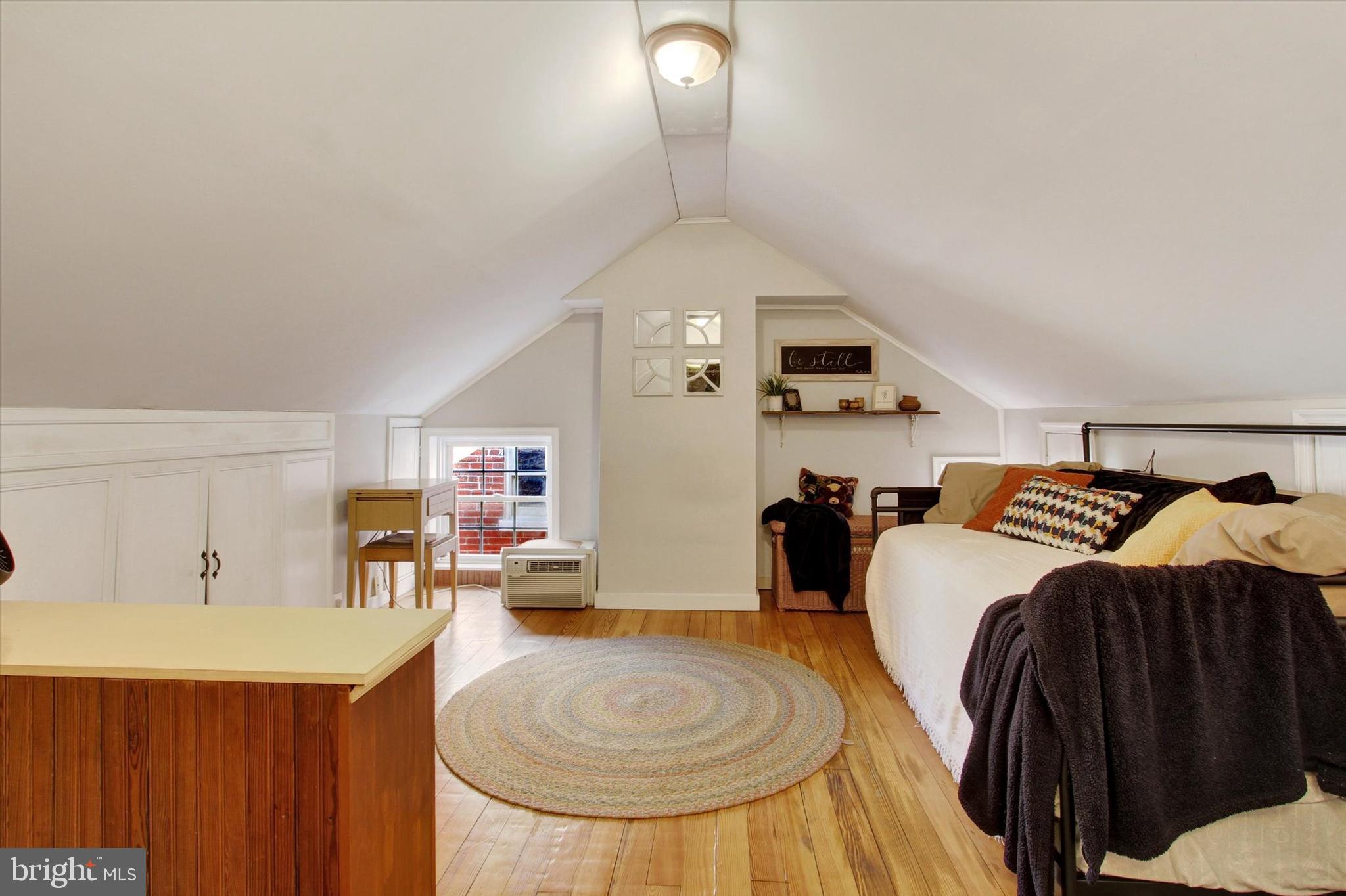 6 North Water Street Spring Grove, PA 17362 - Photo 26 of 37 a living room with furniture and a fireplace