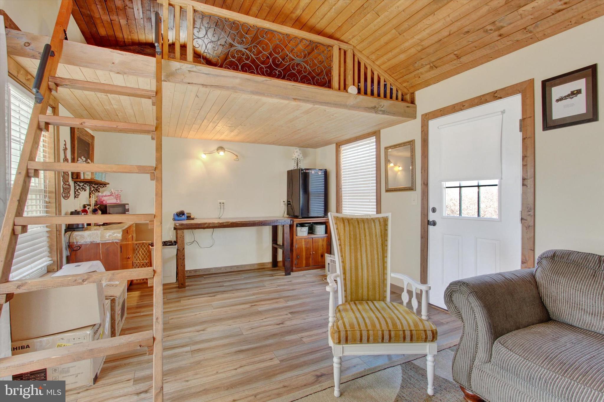 6 North Water Street Spring Grove, PA 17362 - Photo 28 of 37 a living room with furniture and a fireplace