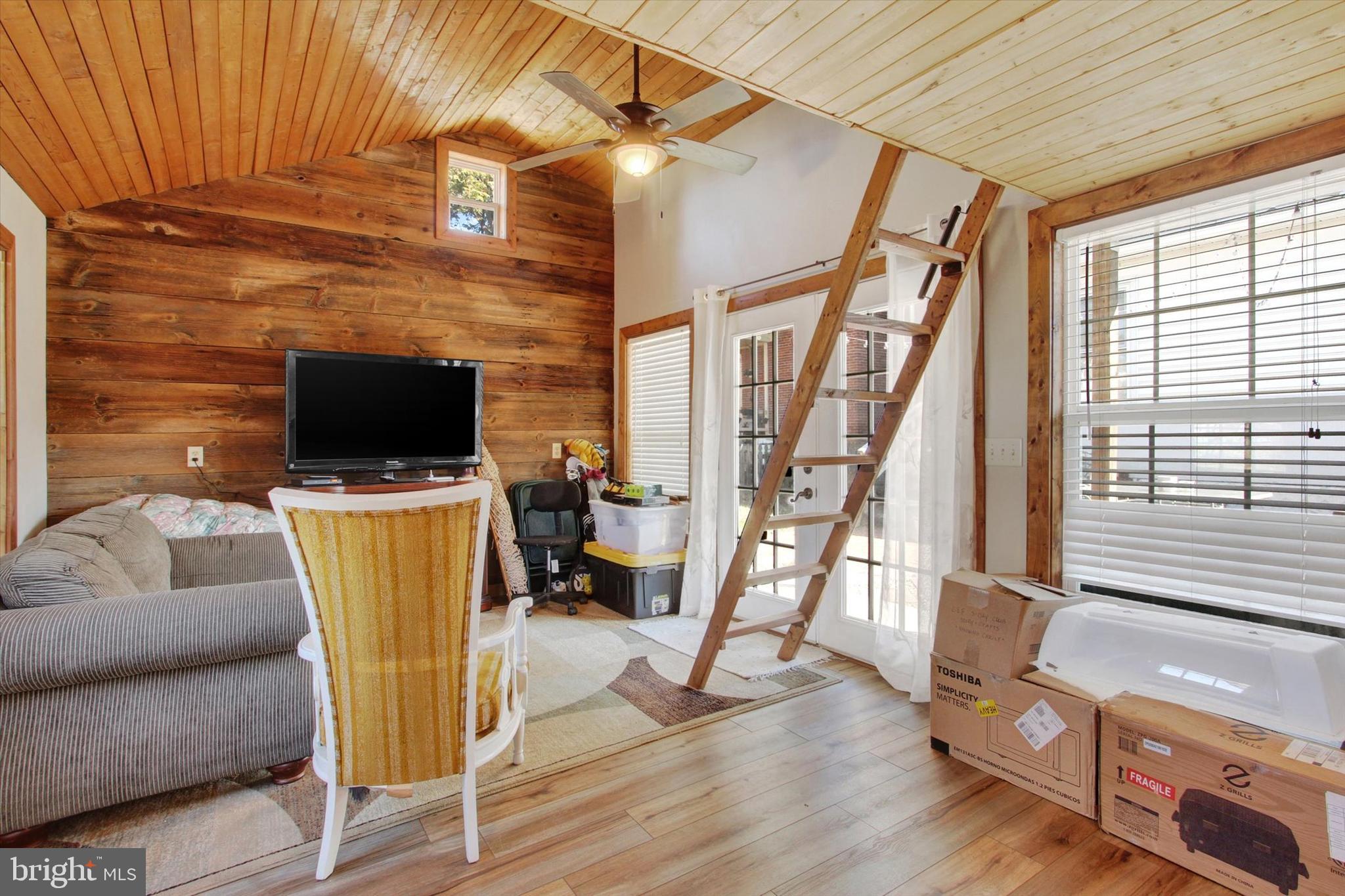 6 North Water Street Spring Grove, PA 17362 - Photo 31 of 37 a living room with furniture and a flat screen tv