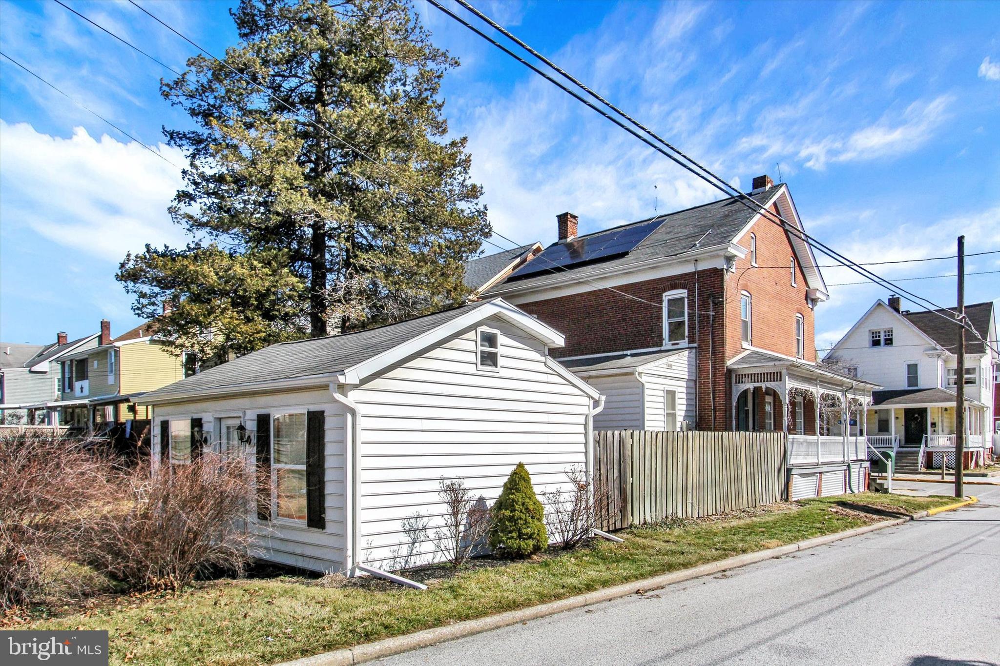 6 North Water Street Spring Grove, PA 17362 - Photo 35 of 37 a front view of a house with a yard