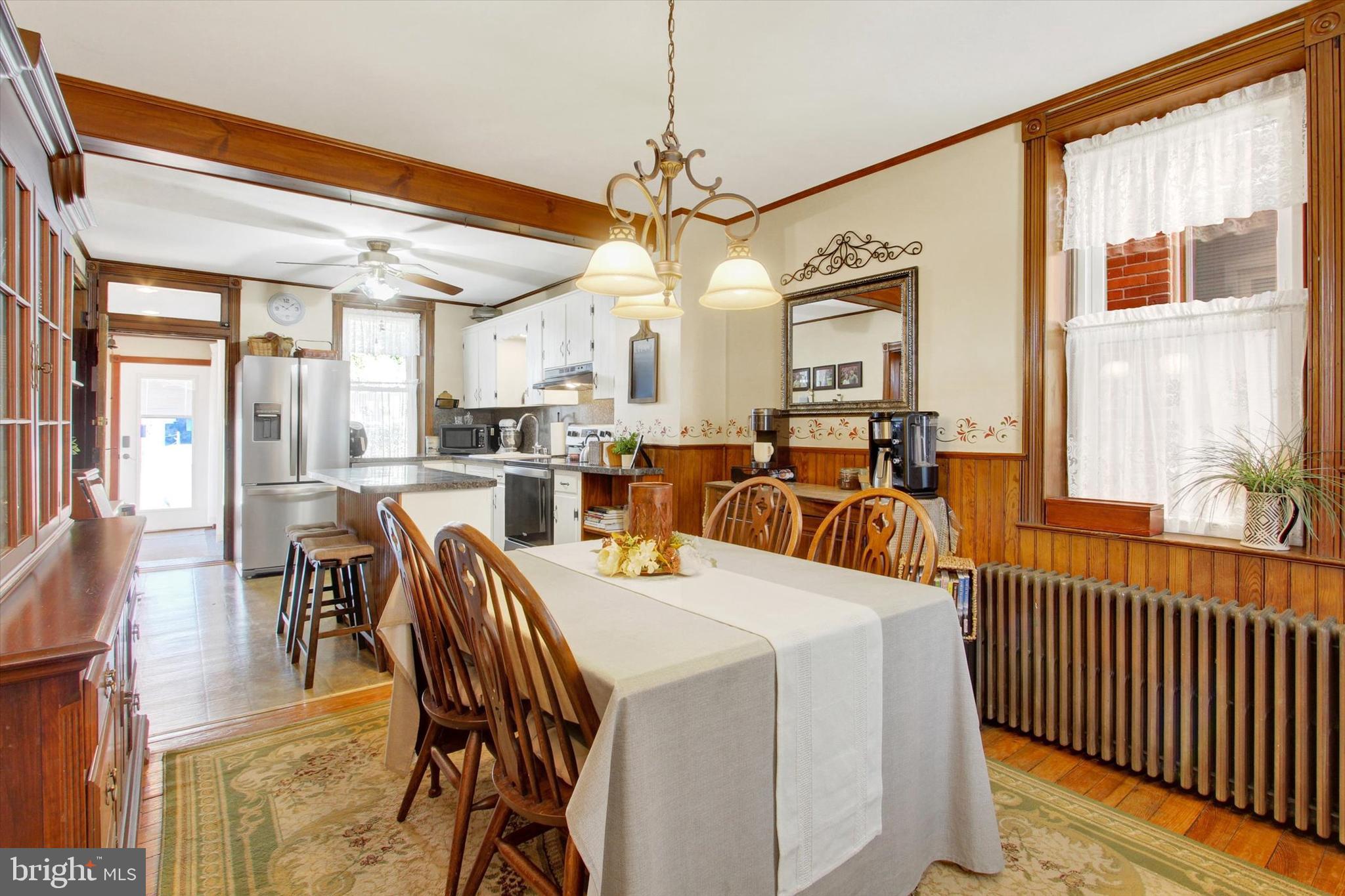 6 North Water Street Spring Grove, PA 17362 - Photo 5 of 37 a dining room with furniture a chandelier and wooden floor