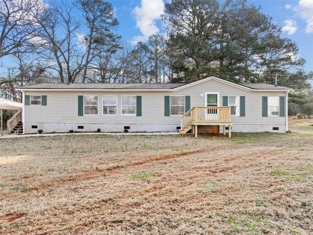 821 Murphy Road Winder, GA 30680 - Photo 1 of 1 a view of a house with a yard