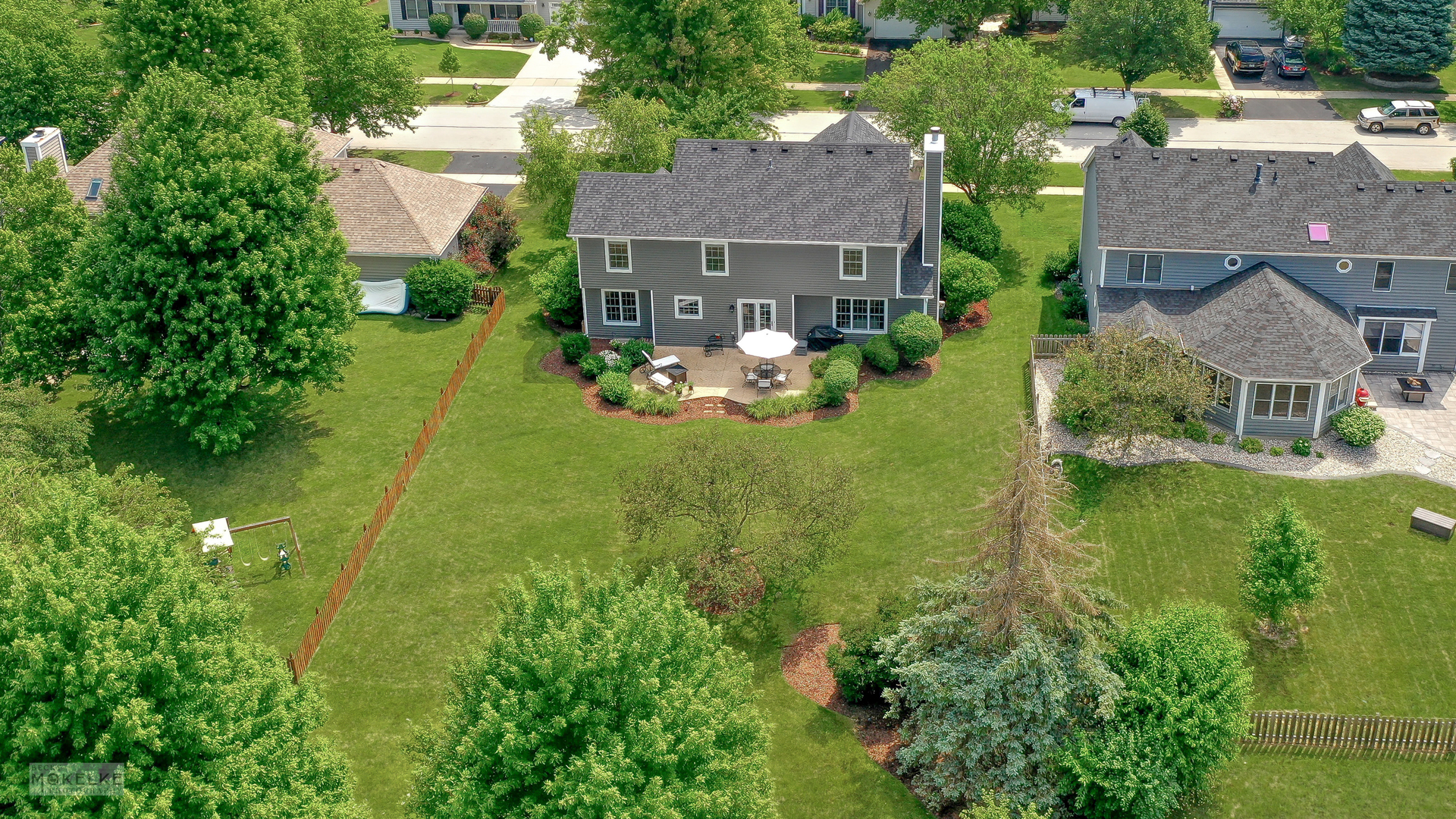 5319 Sand Lily Drive Naperville, IL 60564 - Photo 43 of 48 a view of a house with a yard porch and sitting area