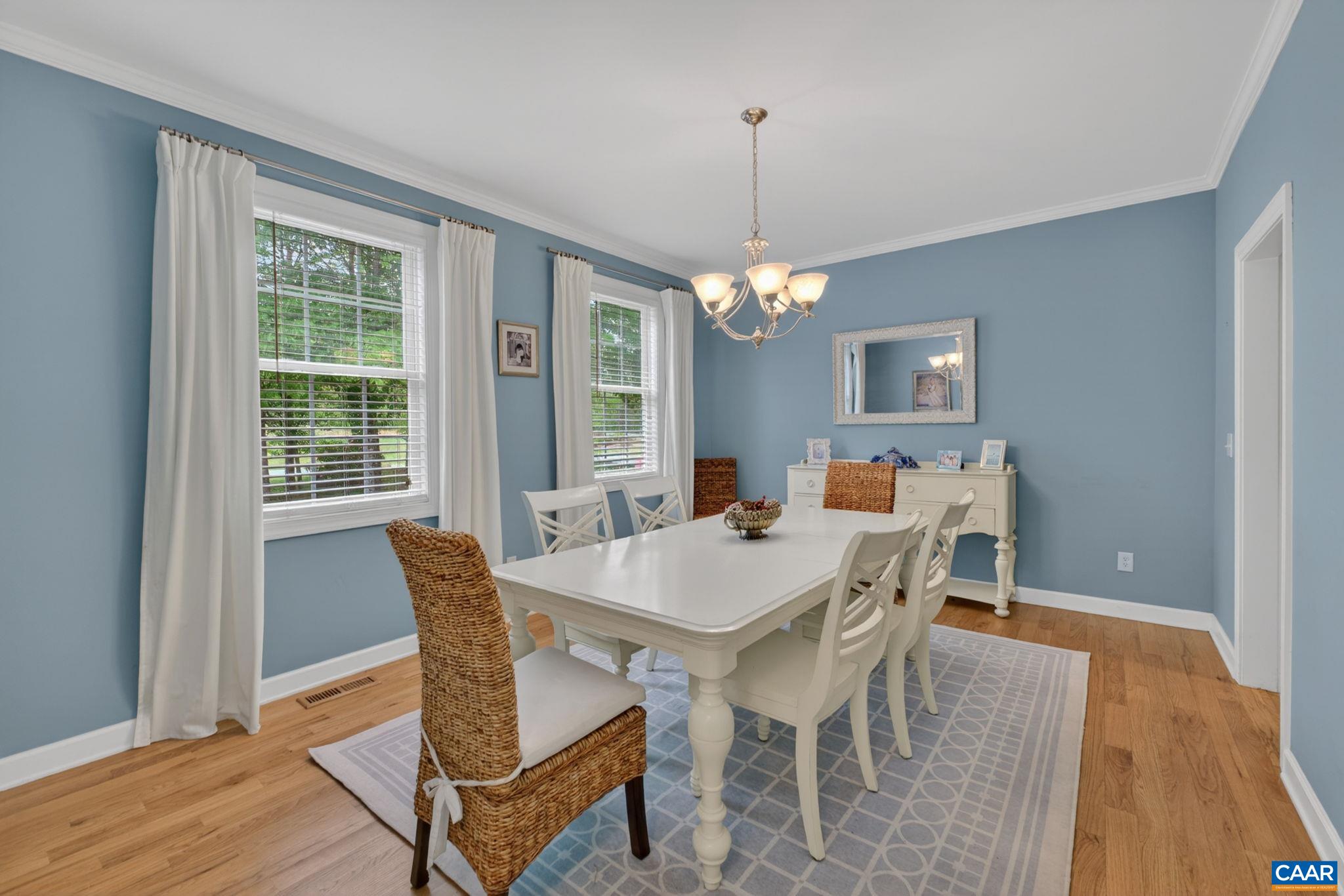 511 Taylor Ridge Way Palmyra, VA 22963 - Photo 8 of 57 a view of a dining room with furniture window and wooden floor