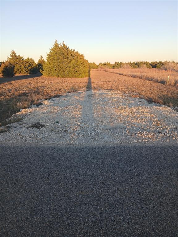 2 Robnett Road Waxahachie, TX 75165 - Photo 4 of 15 a view of a lake with a mountain