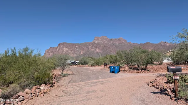 a view of road with a car parked on road
