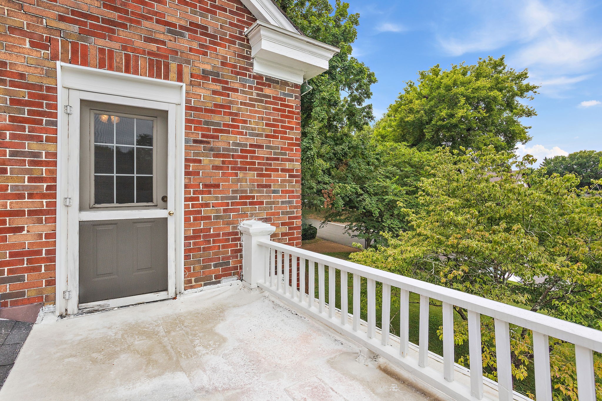 118 Mockingbird Road Nashville, TN 37205 - Photo 33 of 48 a view of a brick house with a small yard