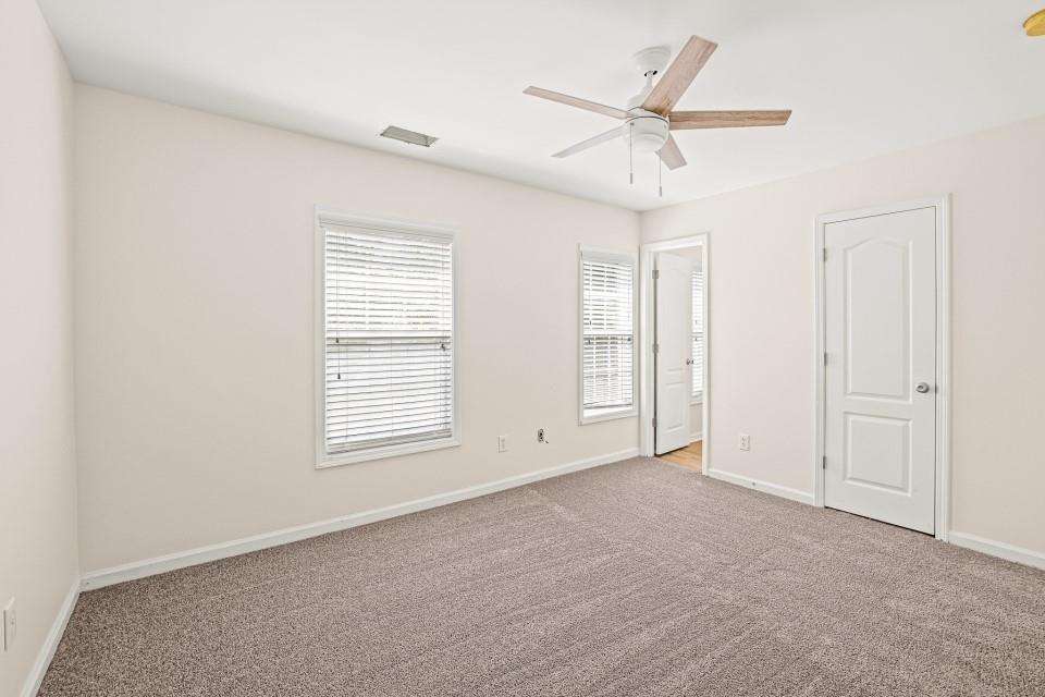 810 Ash Street Canton, GA 30114 - Photo 14 of 16 a view of an empty room with a window