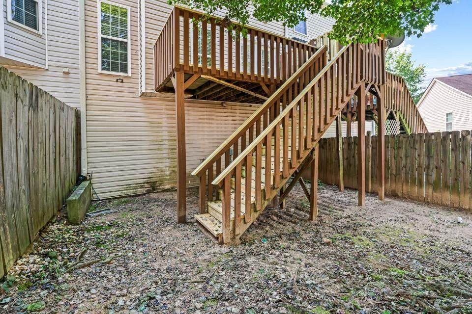 810 Ash Street Canton, GA 30114 - Photo 4 of 16 a view of entryway with wooden stairs