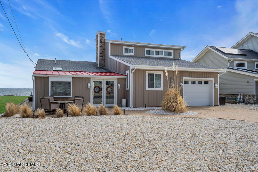 1604 Beach Boulevard Forked River, NJ 08731 - Photo 11 of 108 a view of a house with backyard porch and sitting area