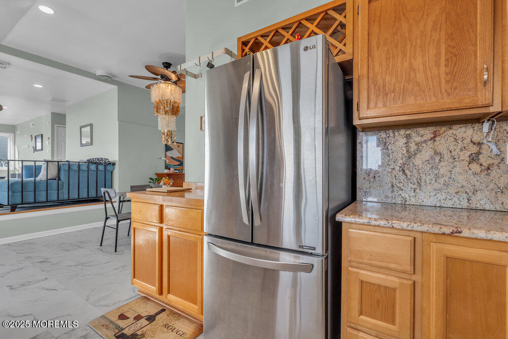 1604 Beach Boulevard Forked River, NJ 08731 - Photo 28 of 108 a kitchen with stainless steel appliances granite countertop a refrigerator and a stove