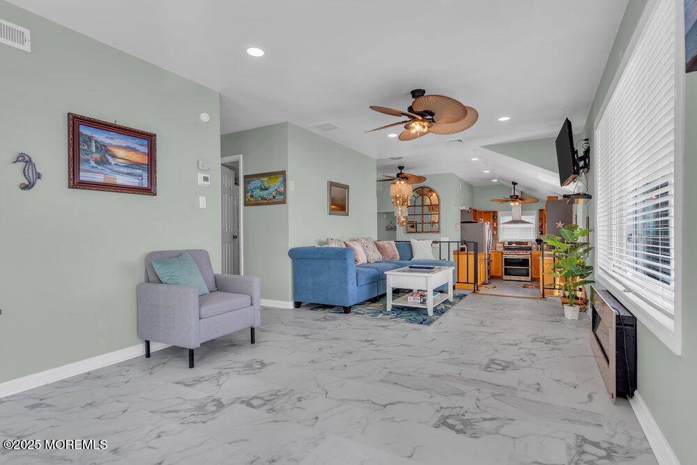 1604 Beach Boulevard Forked River, NJ 08731 - Photo 40 of 108 a view of a livingroom with furniture and a ceiling fan