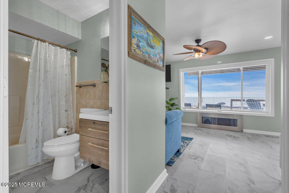 1604 Beach Boulevard Forked River, NJ 08731 - Photo 48 of 108 a bathroom with a sink a toilet and a shower