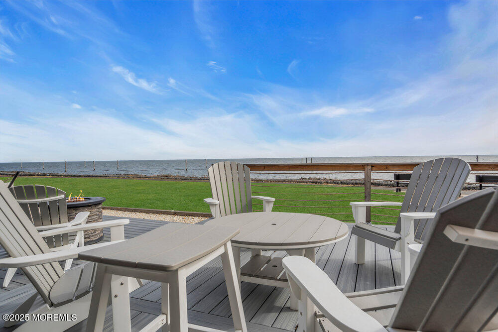 1604 Beach Boulevard Forked River, NJ 08731 - Photo 5 of 108 a view of a patio with a table and chairs