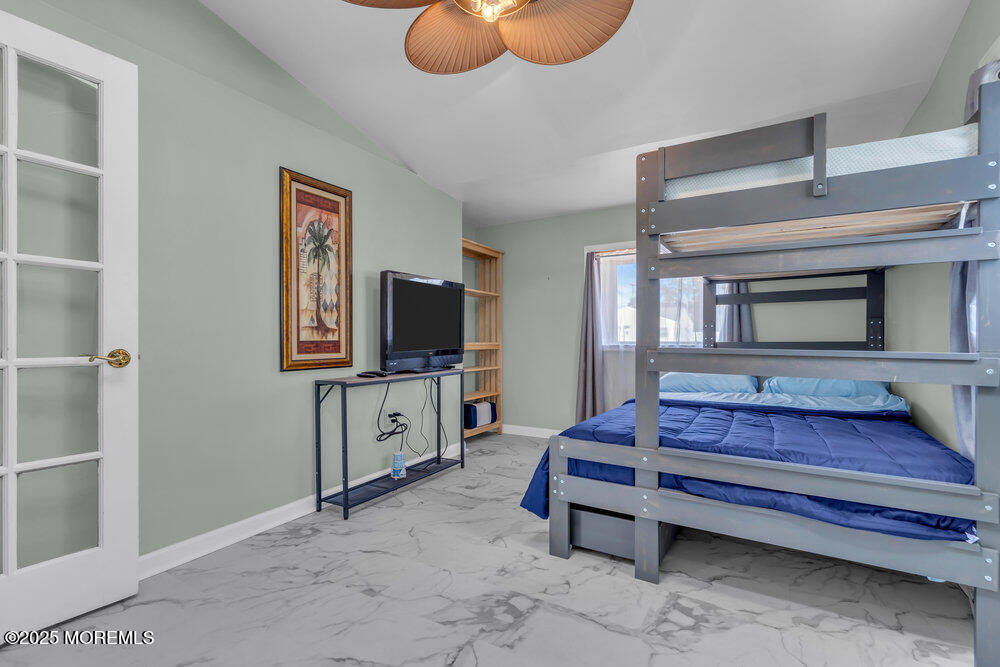 1604 Beach Boulevard Forked River, NJ 08731 - Photo 68 of 108 a living room with furniture and a flat screen tv