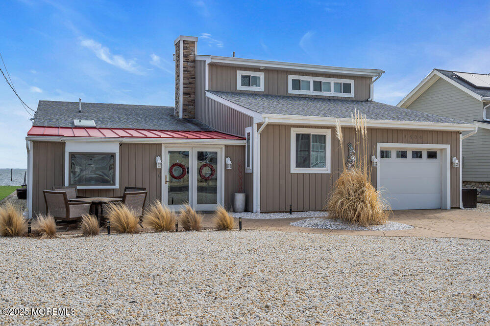 1604 Beach Boulevard Forked River, NJ 08731 - Photo 7 of 108 a front view of a house with garden