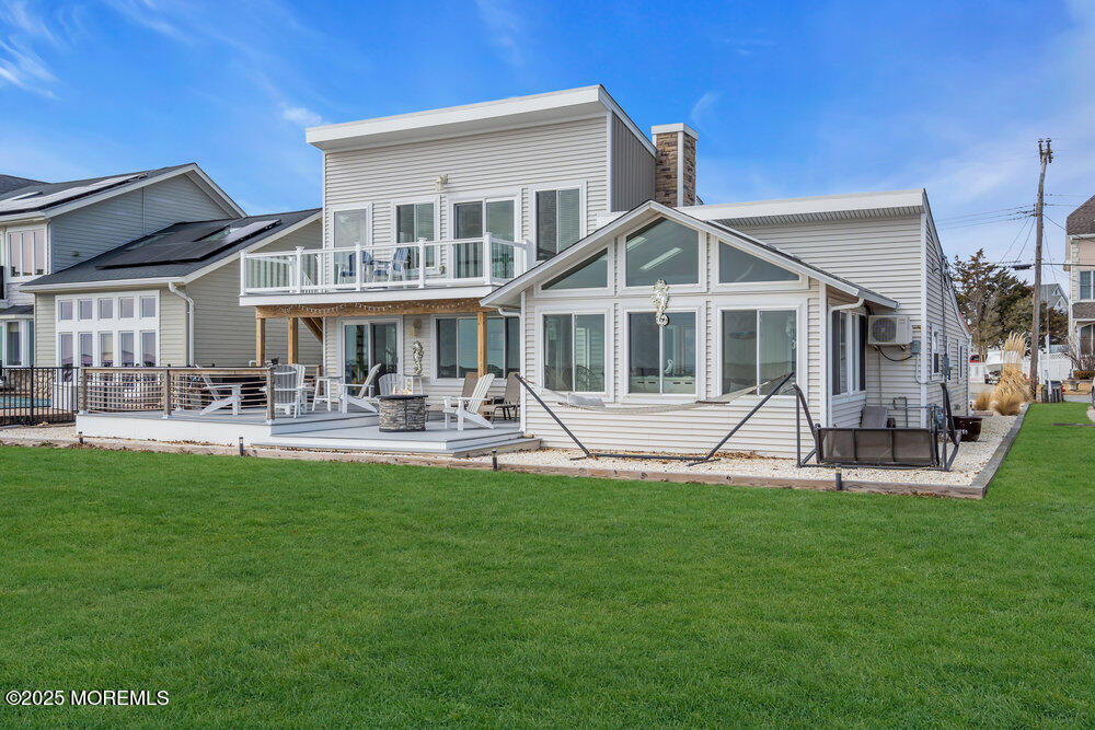 1604 Beach Boulevard Forked River, NJ 08731 - Photo 85 of 108 a view of a house with a yard and sitting area