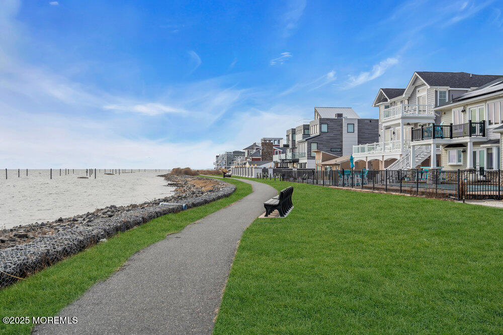 1604 Beach Boulevard Forked River, NJ 08731 - Photo 86 of 108 a view of a lake with a big yard and large trees