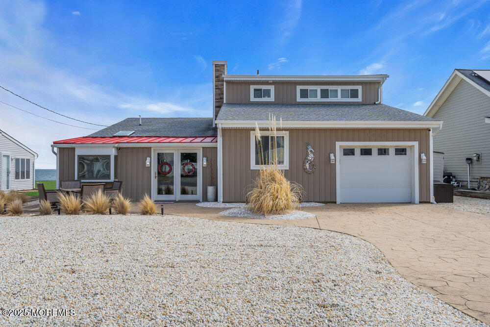 1604 Beach Boulevard Forked River, NJ 08731 - Photo 10 of 108 a front view of a house with a patio