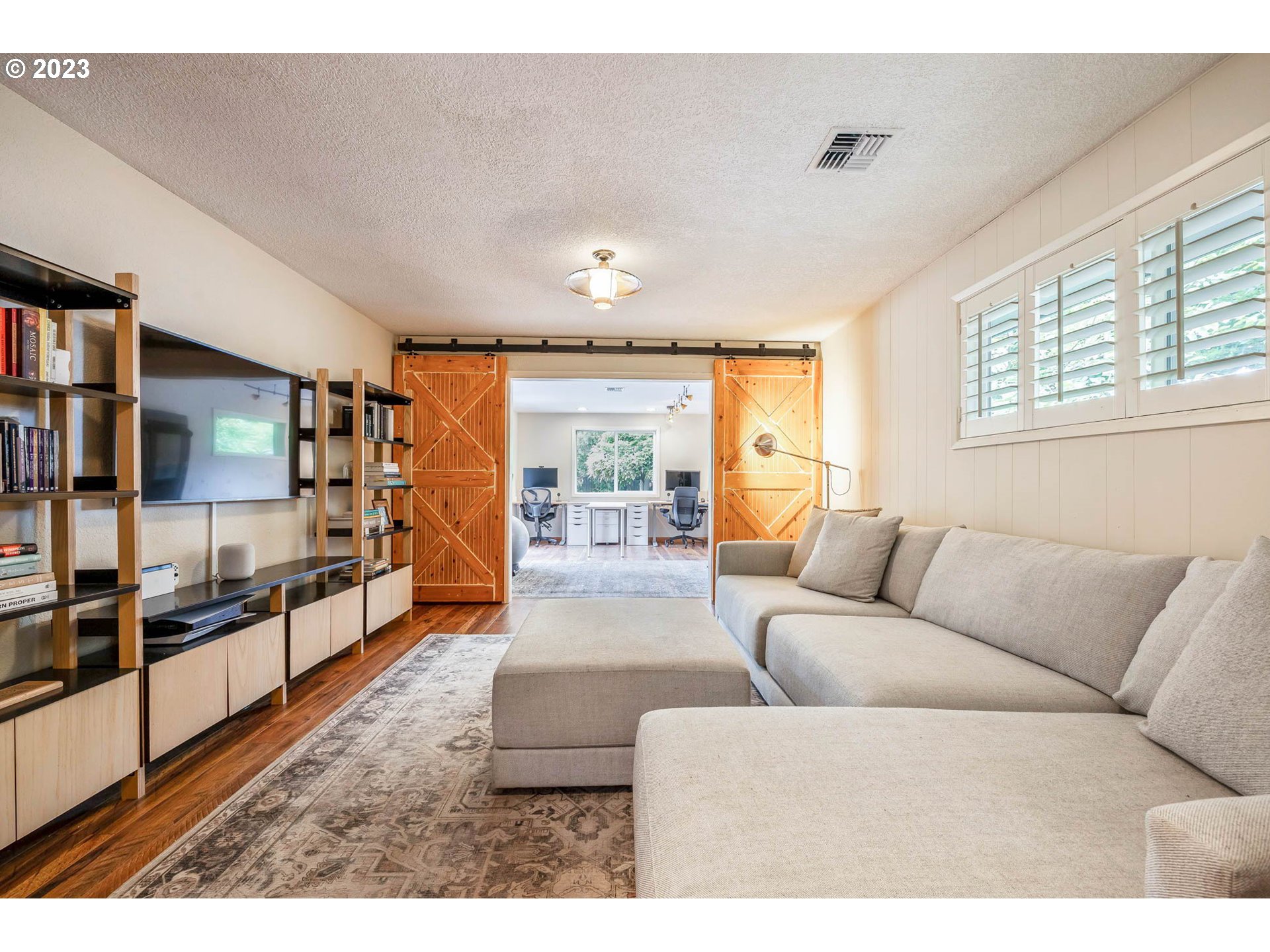 3555 Bardell Avenue Eugene, OR 97401 - Photo 11 of 31 a living room with furniture and a large window