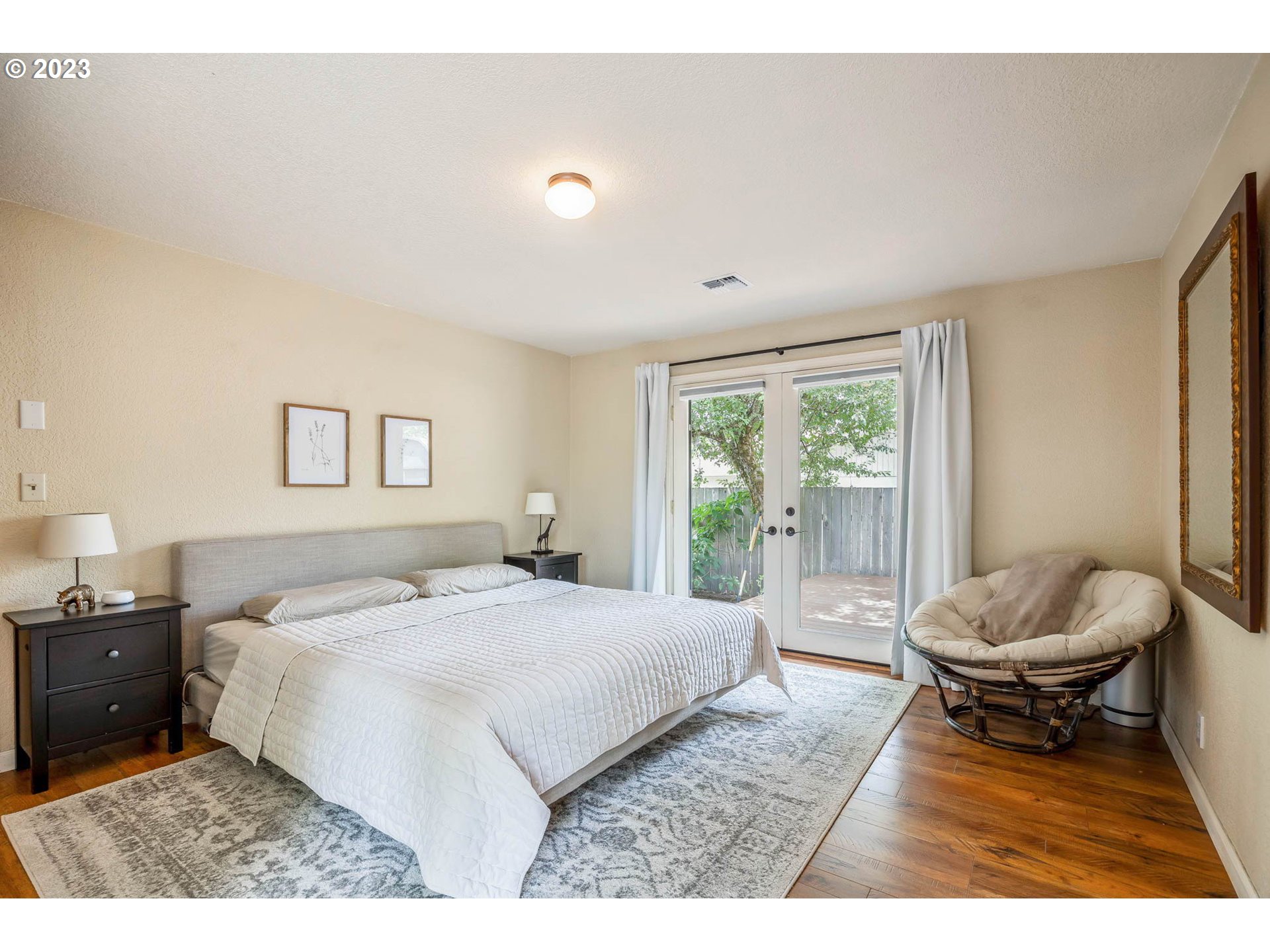 3555 Bardell Avenue Eugene, OR 97401 - Photo 19 of 31 a bedroom with a bed and a large window