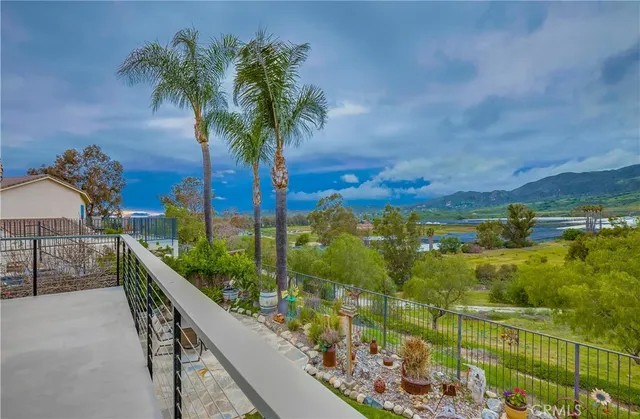 a view of a chairs and table on the terrace