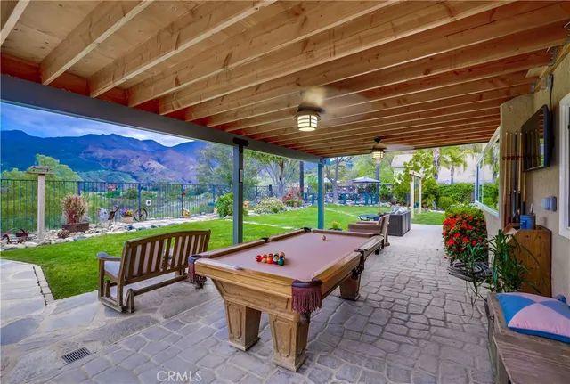 a outdoor space with tables and chairs
