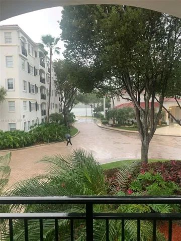 a view of a lake from a balcony
