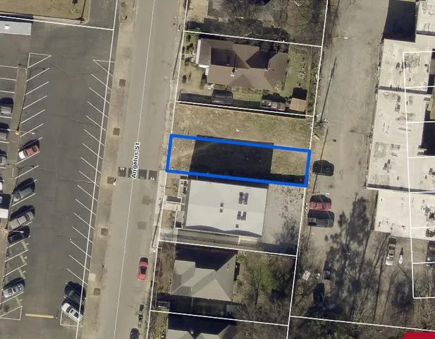 a bathroom with a shower and mirror