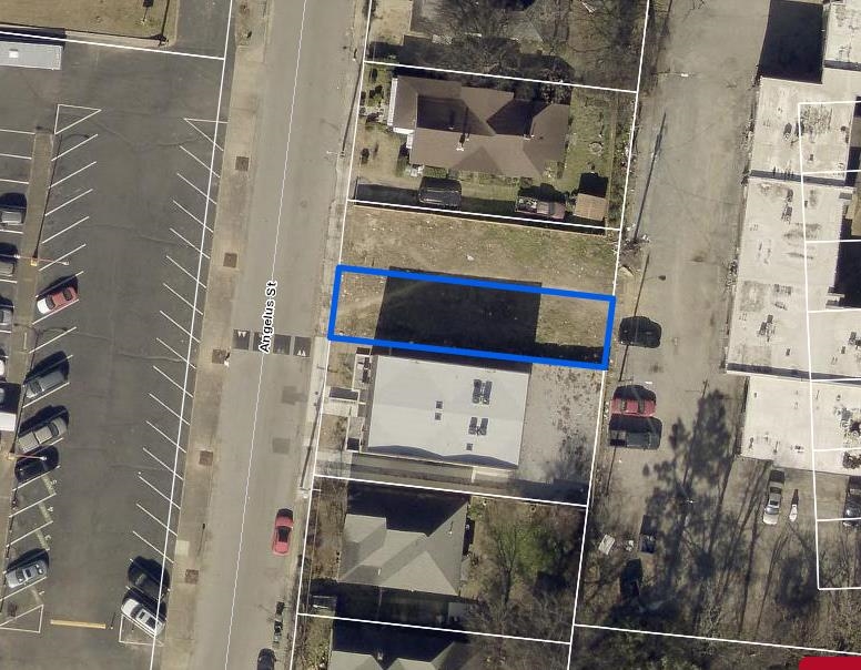 a bathroom with a shower and mirror