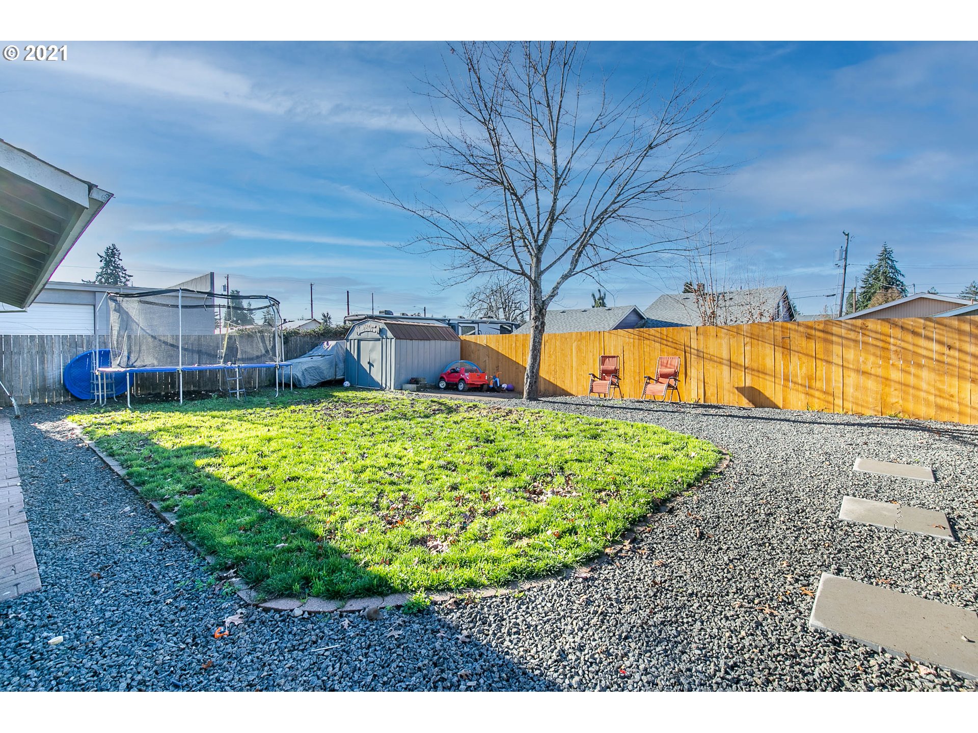 168 North 38th Place Springfield, OR 97478 - Photo 17 of 19 a view of a backyard with a garden and plants