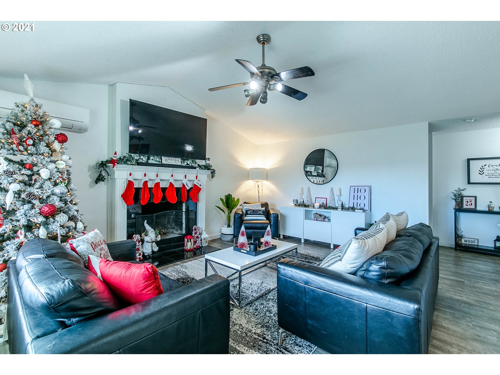 168 North 38th Place Springfield, OR 97478 - Photo 3 of 19 a living room with furniture and a flat screen tv
